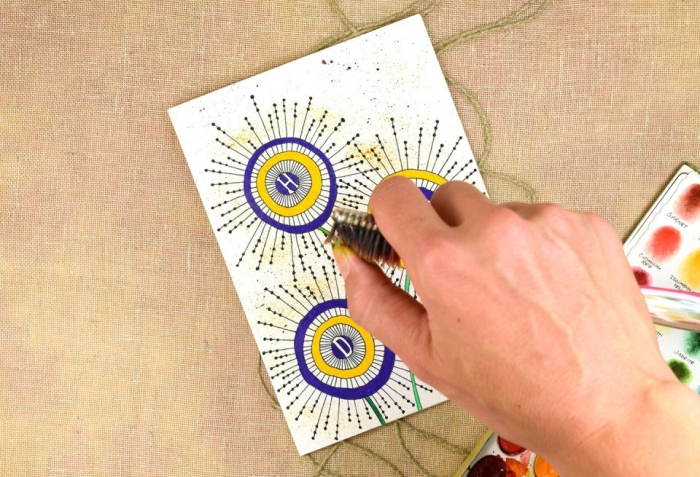 card sprayed with toothbrush, birthday greeting cards, yellow and purple circles, in the shape of flowers