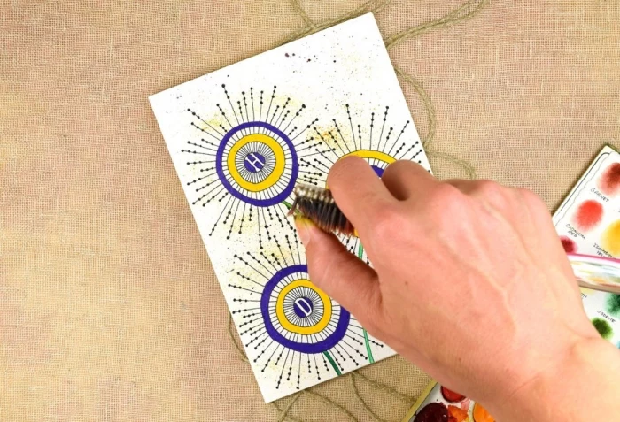 card sprayed with toothbrush, birthday greeting cards, yellow and purple circles, in the shape of flowers