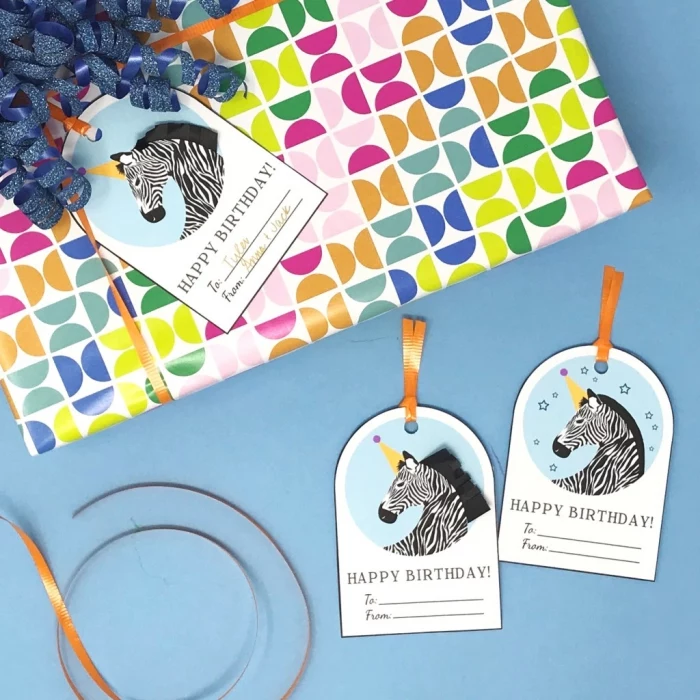 colourful wrapping paper, zebra unicorn, gift tags, birthday cards for best friend, blue background