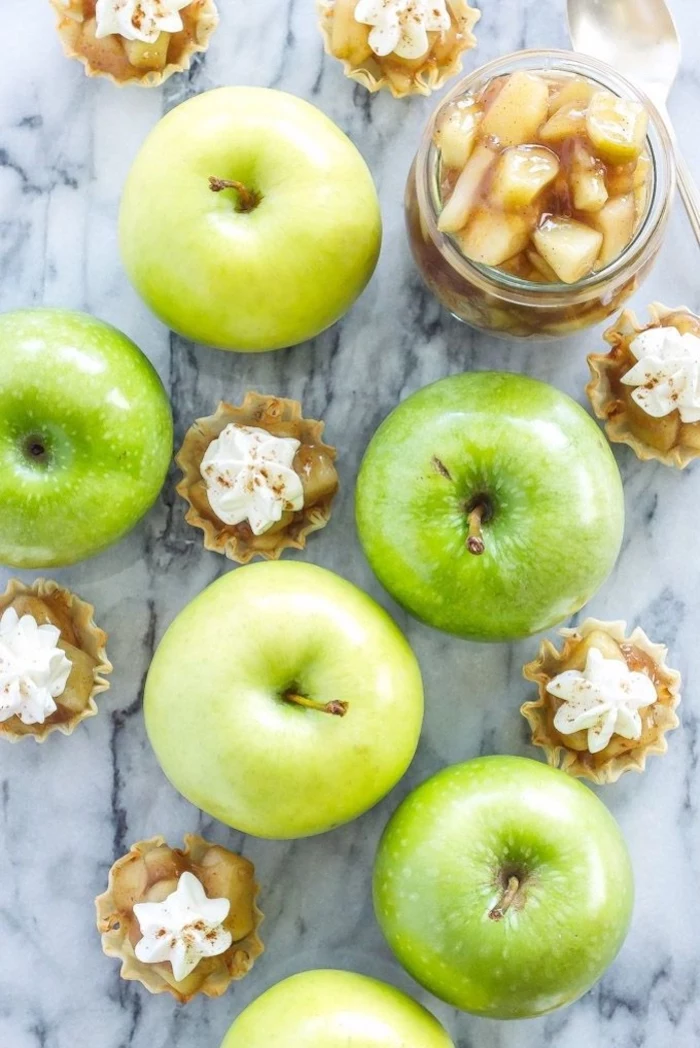 green apples, apple jam, with cream on top, vegan hors d oeuvres, marble countertop