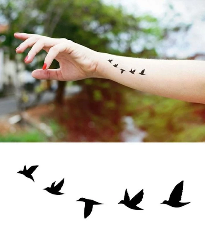 birds flying, wrist tattoo, red nail polish, arm tattoos for women