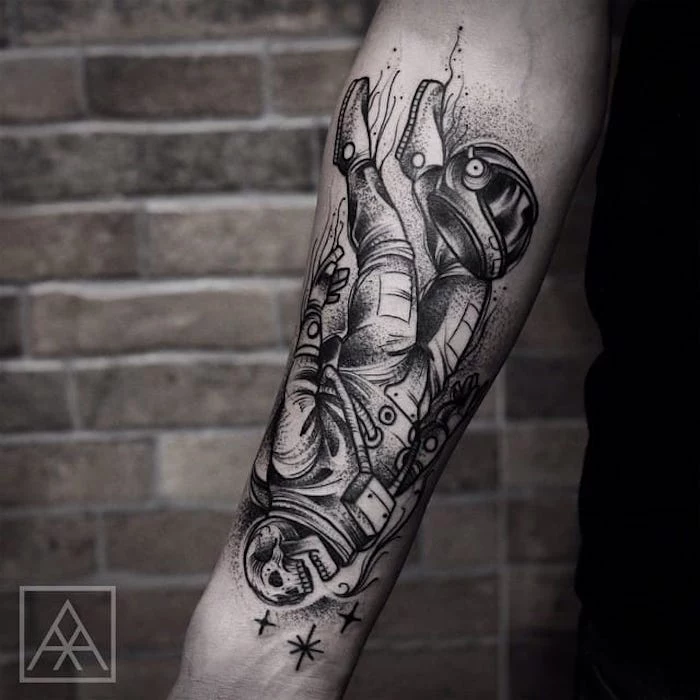 forearm tattoos for men, brick wall, astronaut skeleton, forearm tattoo