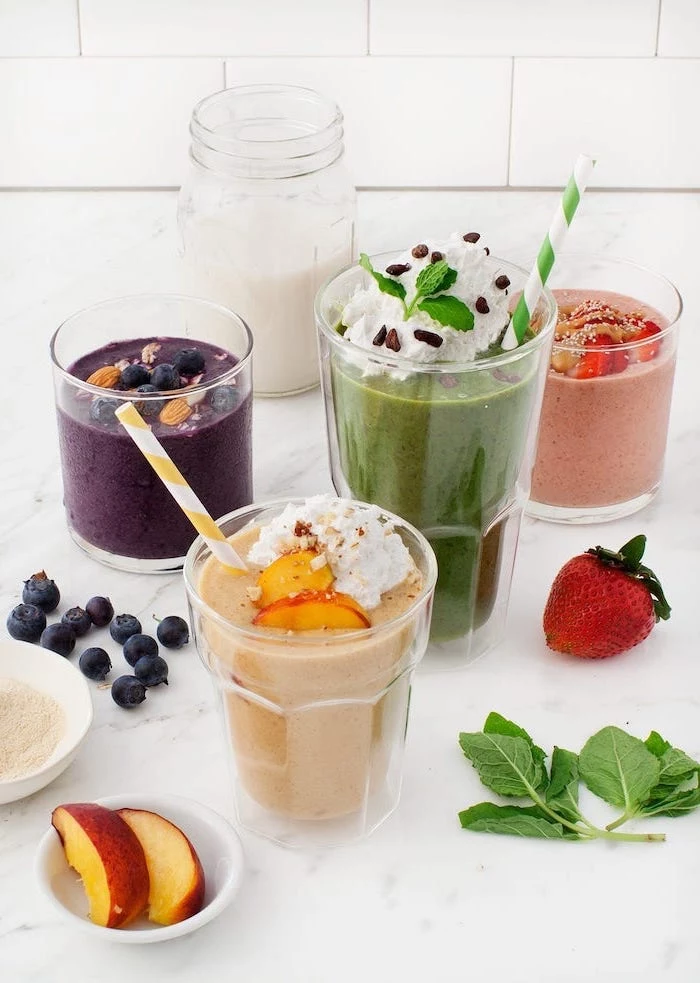banana smoothie recipe, different smoothies, in different glasses, fruit slices around