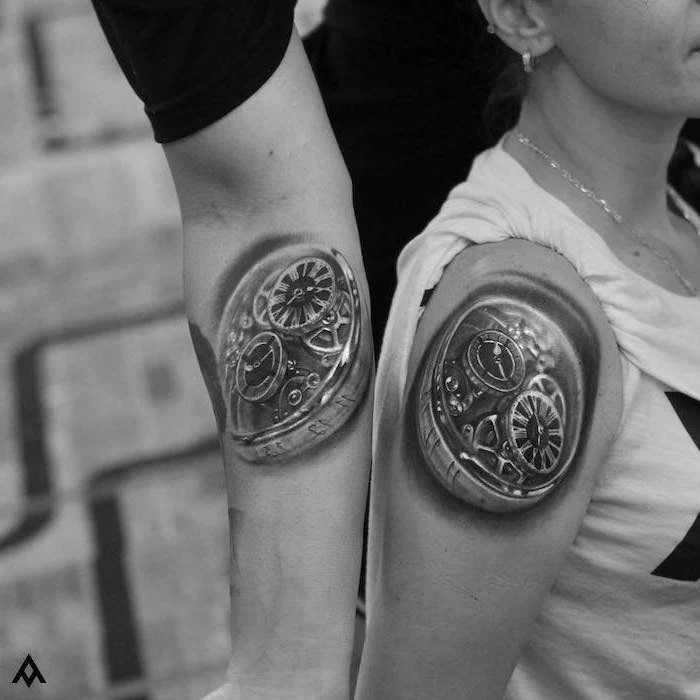 biomechanical shoulder tattoos, relationship tattoos, black and white photo