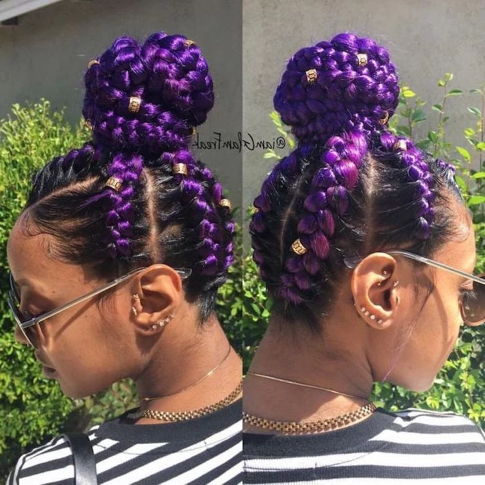 woman with black and purple hair, ghana braids styles, in a bun, black and white striped blouse
