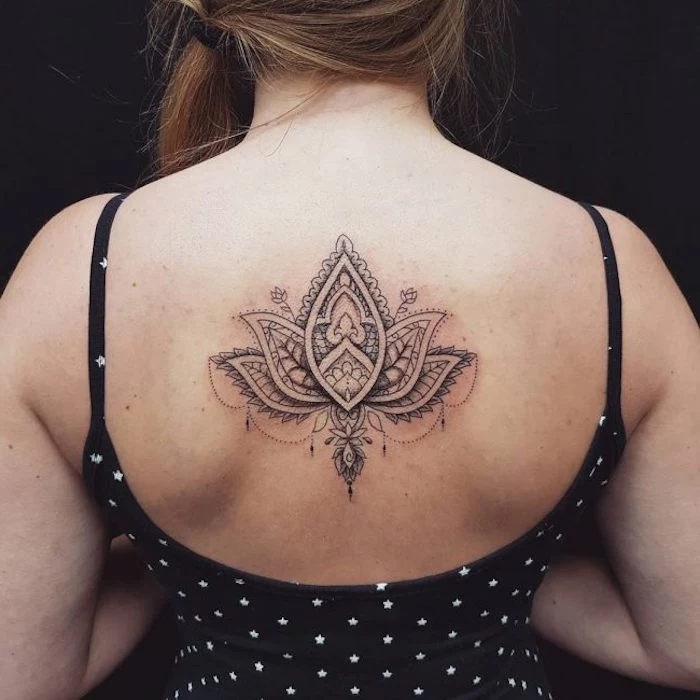 black top, with white stars, shoulder tattoos for girls, lotus flower, mandala back tattoo