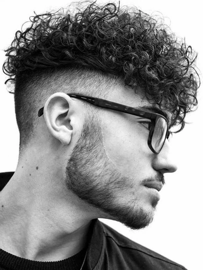 guy hairstyles, black curly hair, black and white photo, man wearing glasses