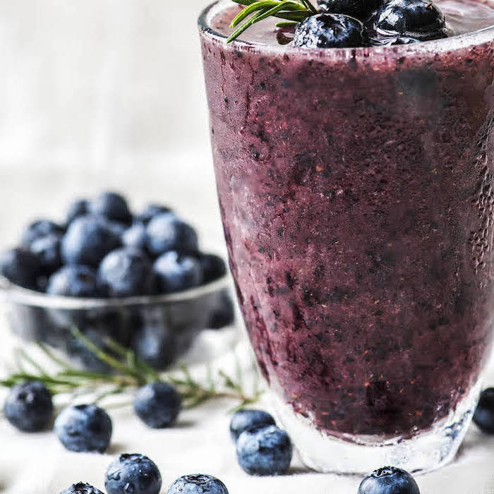 dark purple smoothie, berries on top, banana smoothie recipe, blackberries in a bowl