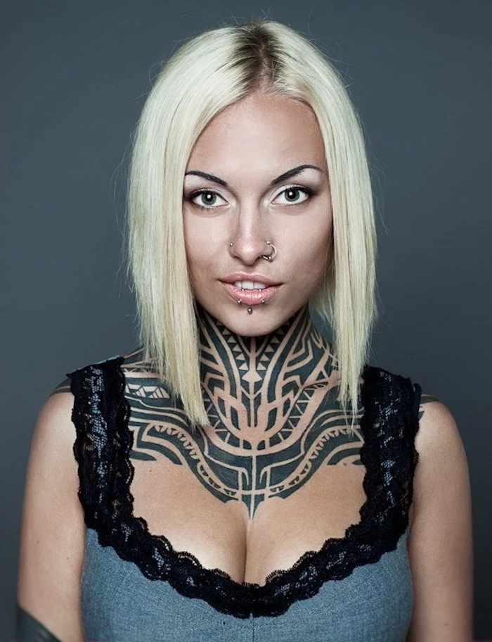 blonde hair, small tattoos for girls, tribal neck tattoo, grey top