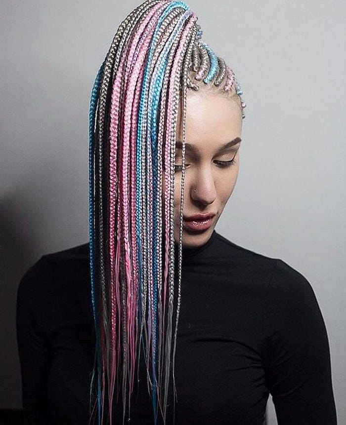 blue and pink, blonde hair, in a ponytail, pictures of braids, woman wearing a black blouse