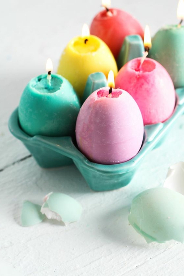 blue egg carton, egg shaped candles, in different colours, how to make a candle wick