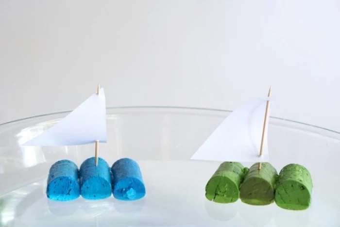 cork screws taped together, painted in blue and green, preschool learning, diy small boats
