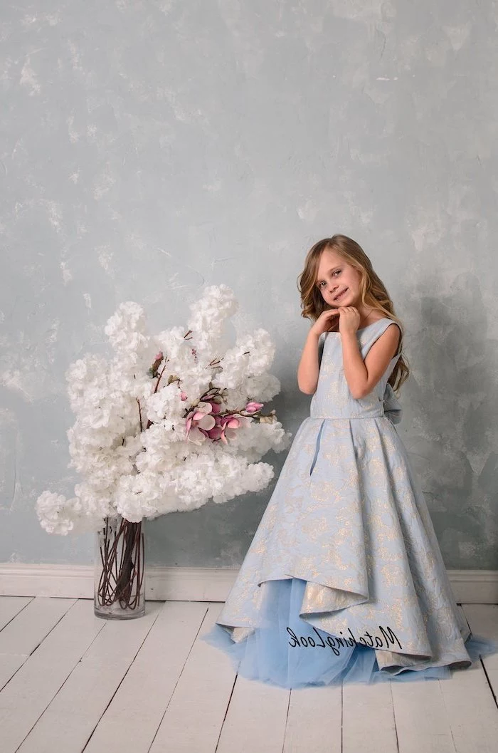 blue and gold, vintage dress, cute girl outfits, white flowers bouquet, wooden floor, long blonde wavy hair