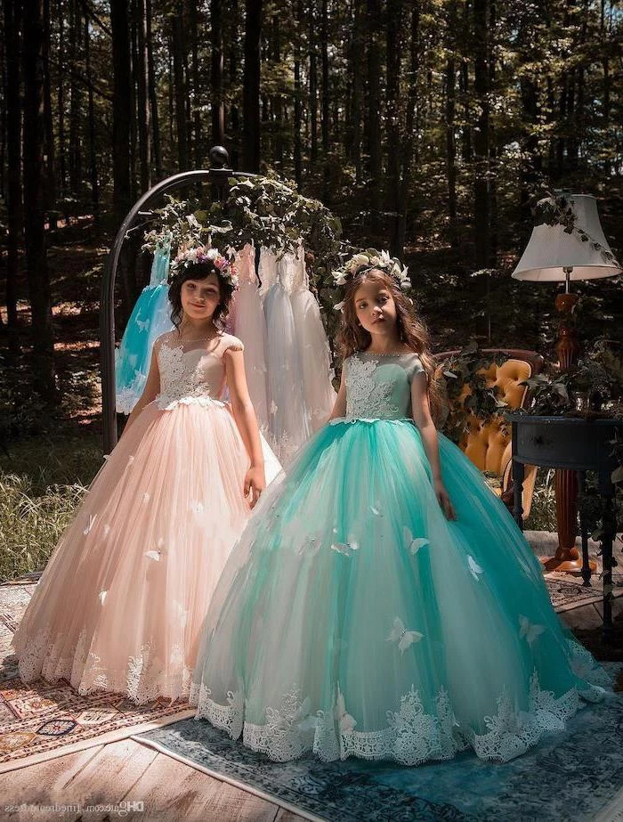 dresses for girls, two girls, turquoise and pink tulle dress, with white lace, flower crowns, in the middle of a forest
