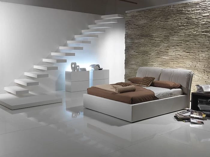 stone wall, white staircase, white leather bed, bedroom design ideas, white tiled floor, minimalist style