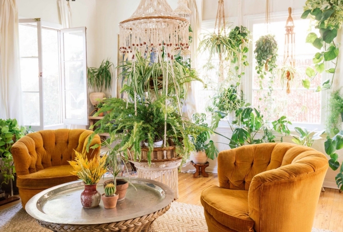 brown velvet armchairs, lots of potted plants, wooden floor, macrame diy, macrame chandelier