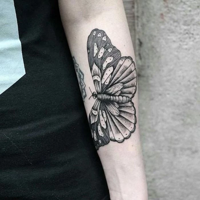 butterfly forearm tattoo, black top, tattoos for women