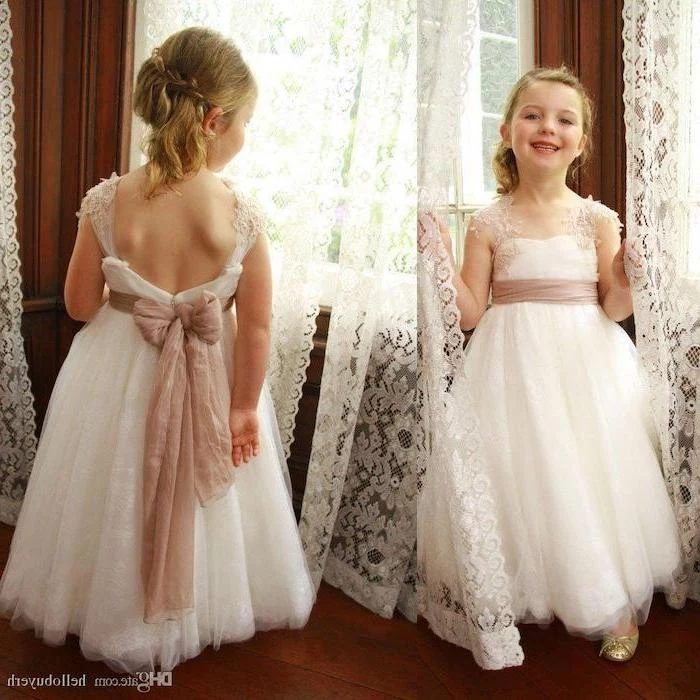 white tulle and lace dress, ivory bow, blonde hair, in a low updo, girls party dresses, white lace curtains