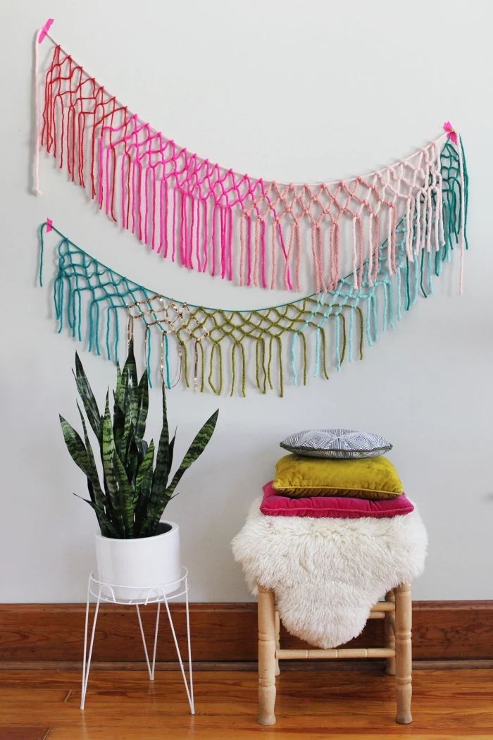 colourful macrame decoration, macrame diy, wooden chair, colourful throw pillows, potted plant