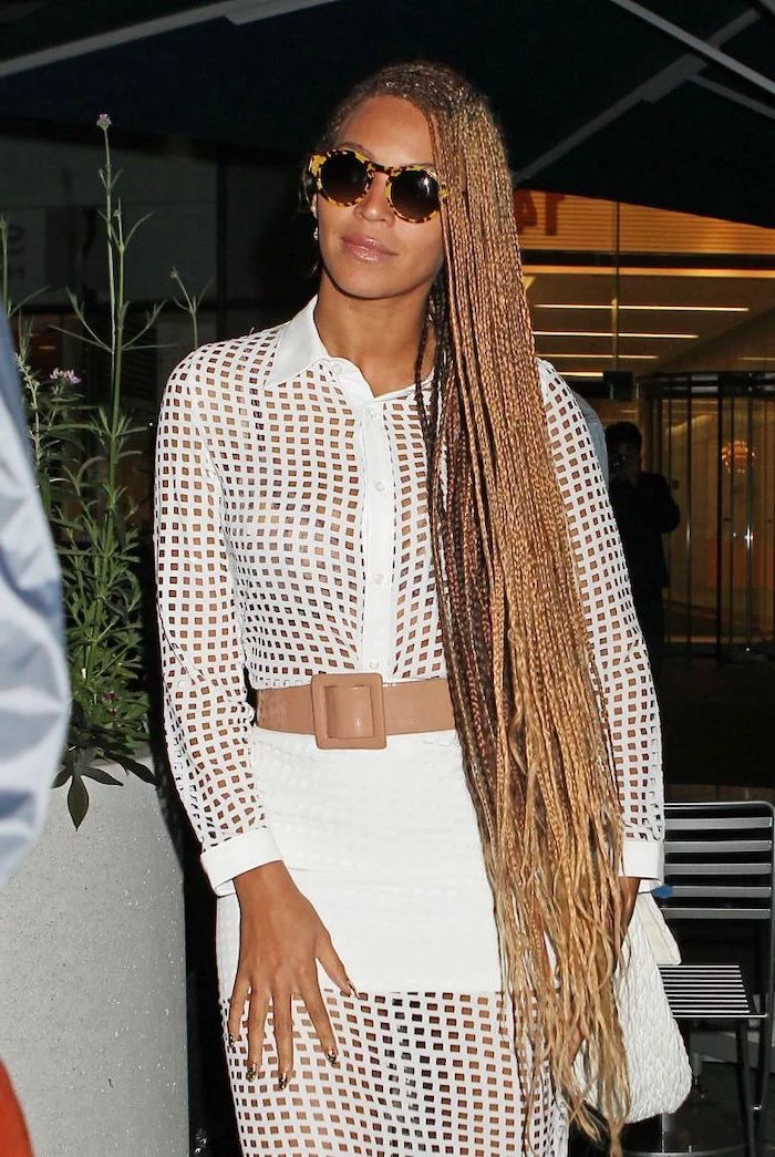 beyonce with very long blonde hair, in a white dress, big cornrows hairstyles