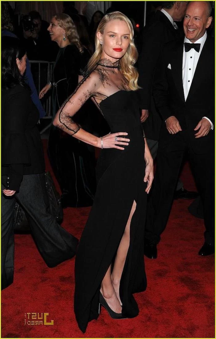 kate bosworth, with a long black dress, lace on top, met gala best dressed, long blonde curly hair