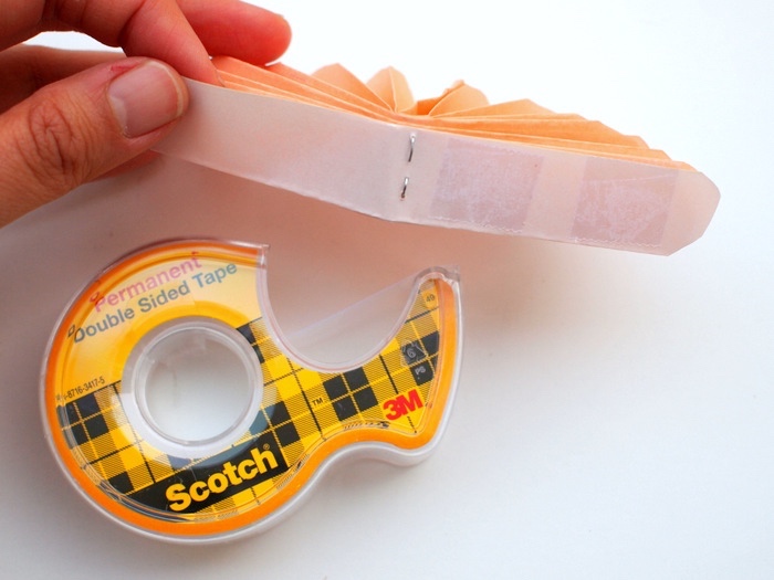 double sided tape, step by step diy tutorial, prek learning games, orange pleated paper