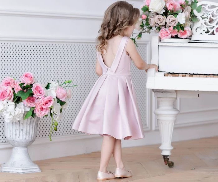 pink satin dress, white piano, blonde wavy hair, pink shoes, flower girl dress, flower bouquets