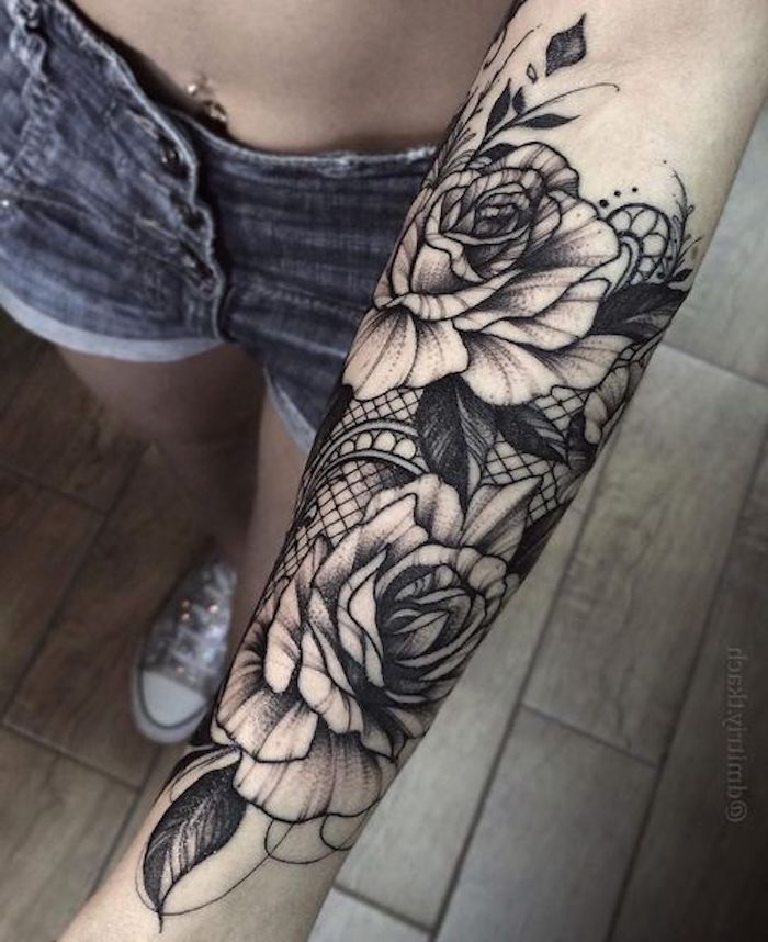 floral forearm tattoo, tattoos for men with meaning, wooden floor, short jeans