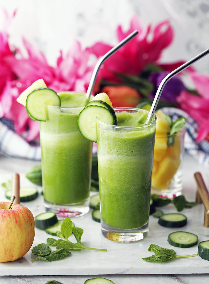 cucumber slices, easy smoothie recipes, silver straws, tall glasses, marble cutting board