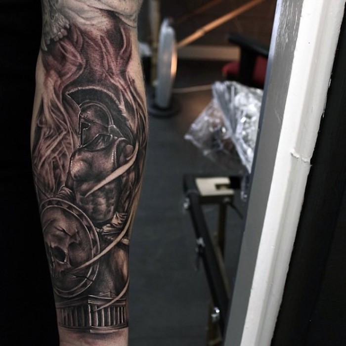gladiator in armour, holding a shield, forearm tattoos for women