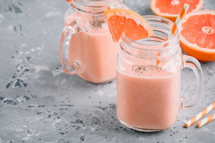 orange and white paper straws, how to make a fruit smoothie, grapefruit slices