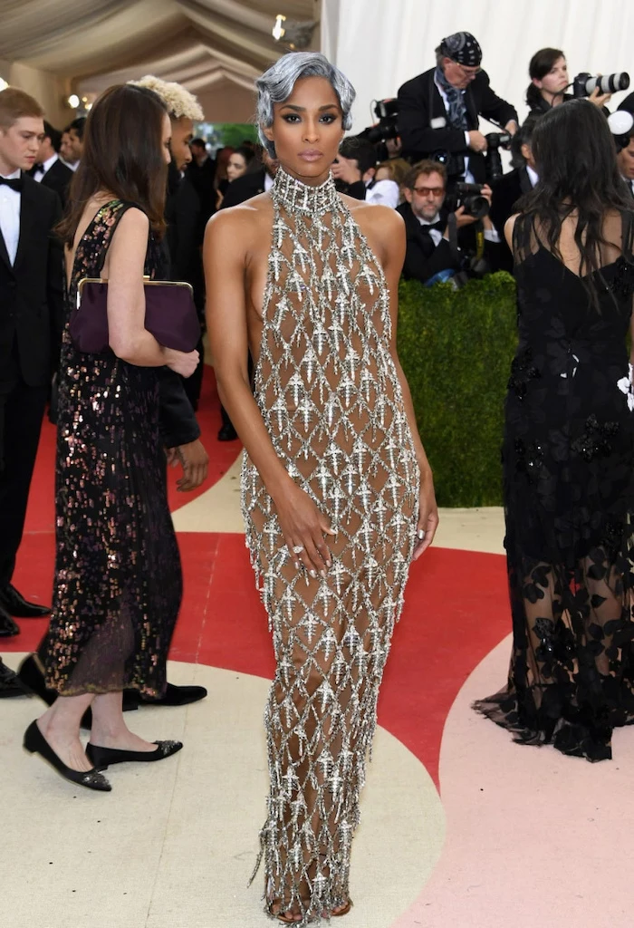 ciara wearing a nude and silver dress, short grey hair, met gala 2017, photographers in the background