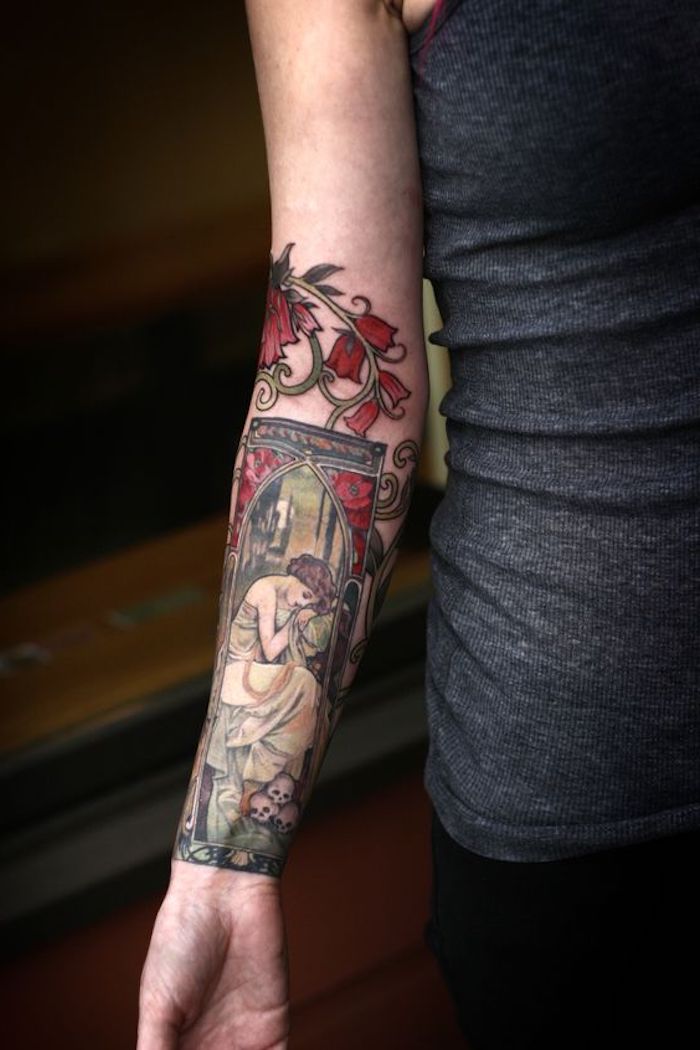 female painting, with skulls and roses, forearm tattoo, chest tattoos for females, grey top