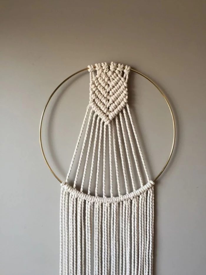 gold ring, white macrame, grey wall, free macrame patterns and instructions