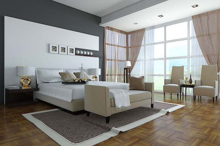 grey and white wall, white leather bed frame, armchairs and sofa, modern bedroom ideas, wooden floor