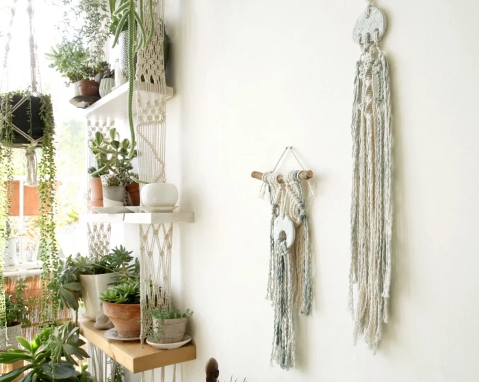 how to make macrame wall hanging, white hanging wooden shelves, white wall, potted plants