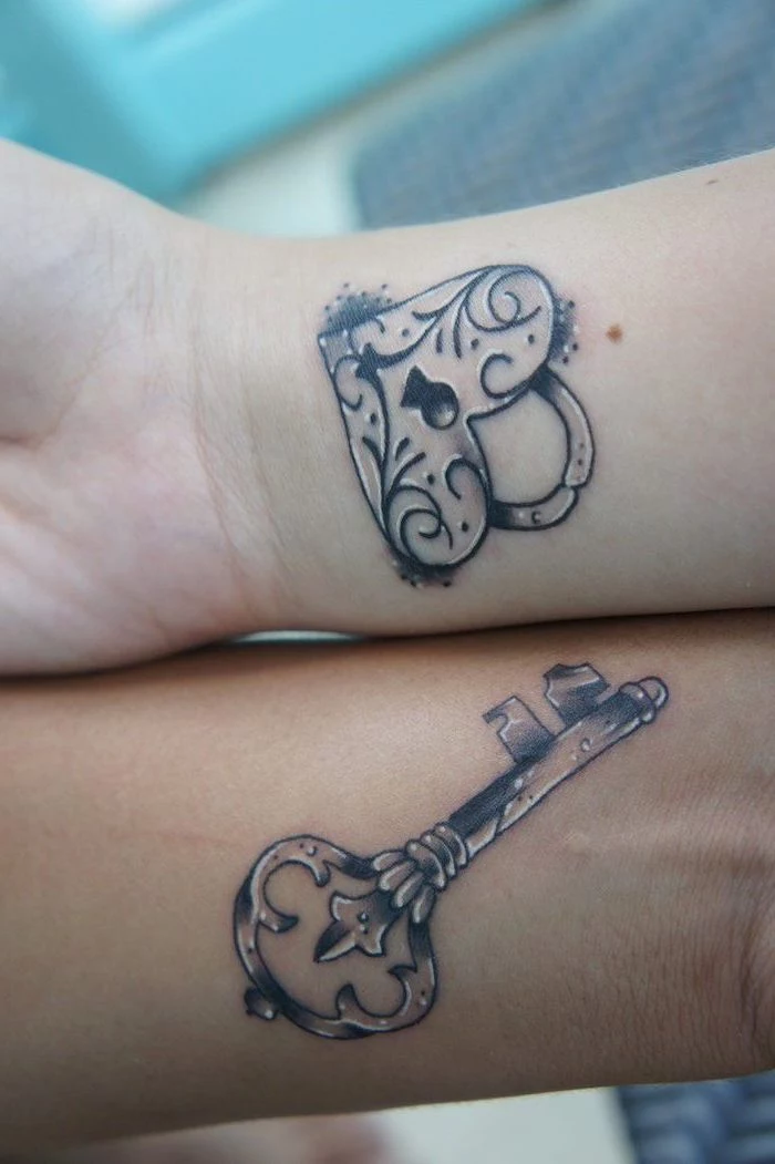 matching tattoos for couples in love, lock and key, wrist tattoos