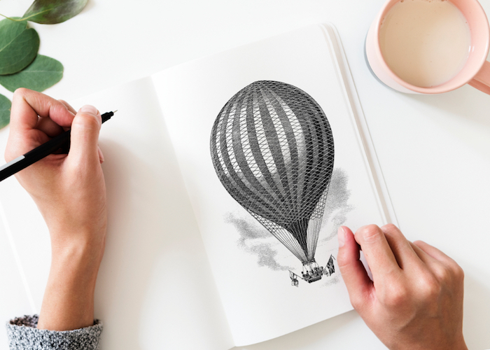 hot air balloon drawing, on a white notebook, 4k iphone wallpaper, black pencil