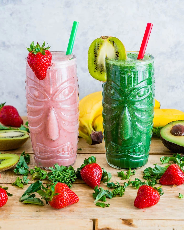 tall glasses, full of pink and green smoothies, different fruits, scattered around, smoothie recipes