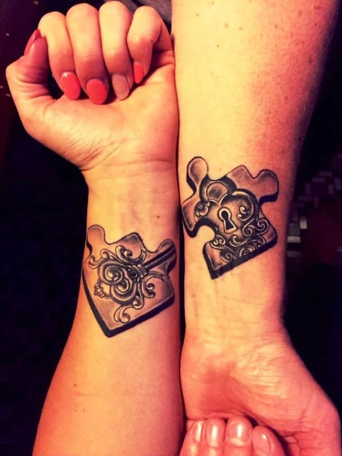 jigsaw puzzle pieces, small matching tattoos, lock and key, wrist tattoos