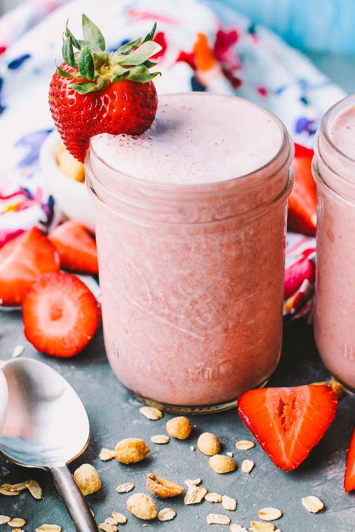 strawberry slices and nuts, how to make a banana smoothie, pink smoothie, in a jar