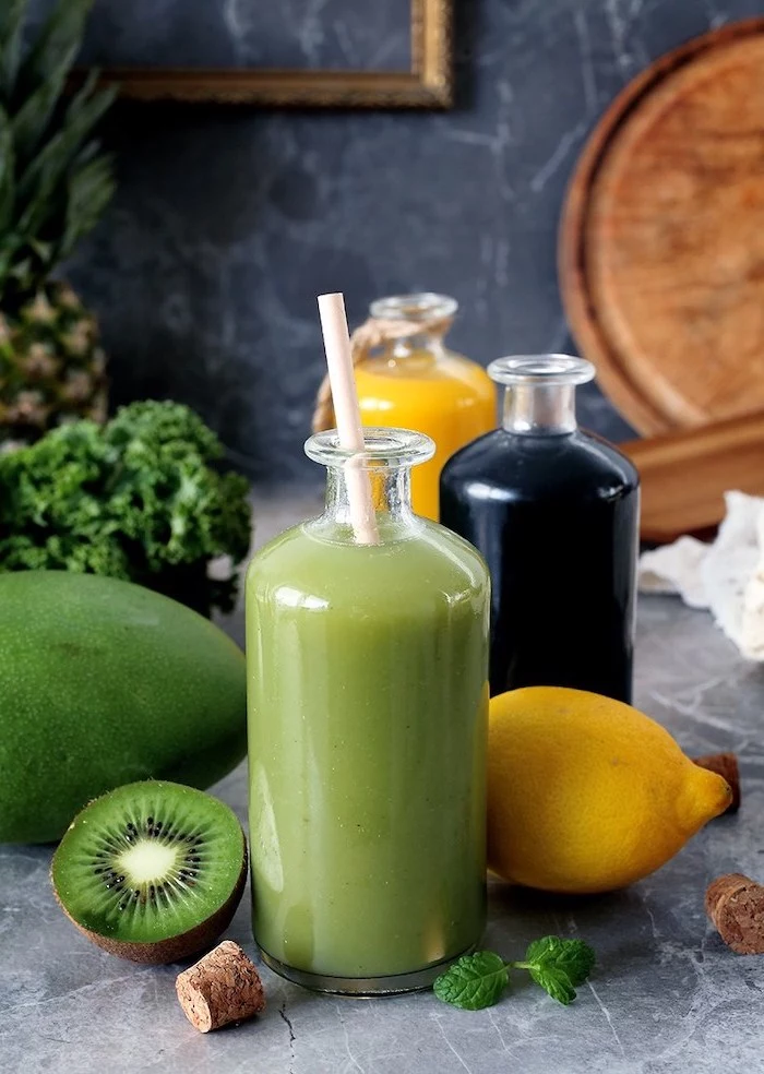tall glass bottles, healthy smoothie recipes, kiwi and lemon, mango and pineapple