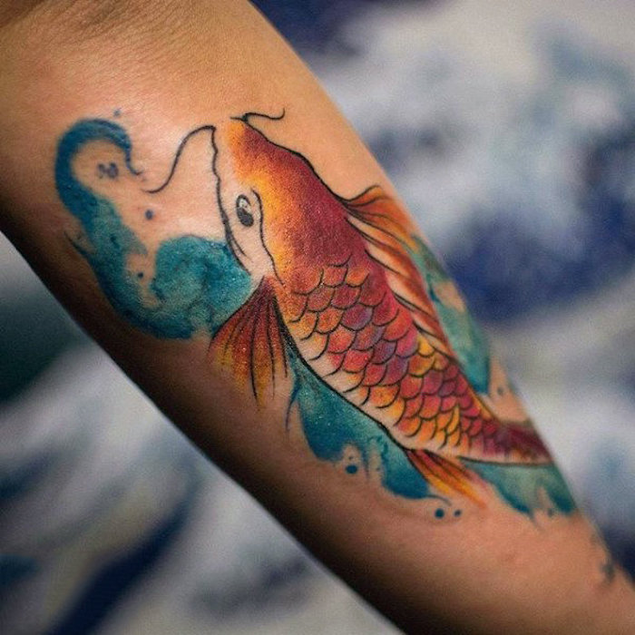 koi fish, watercolour forearm tattoo, simple tattoos for men, blurred background