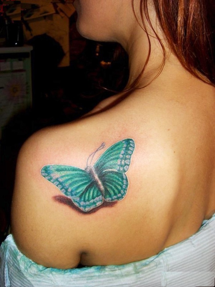 turquoise butterfly, shoulder tattoo, ginger hair, leg tattoos for women