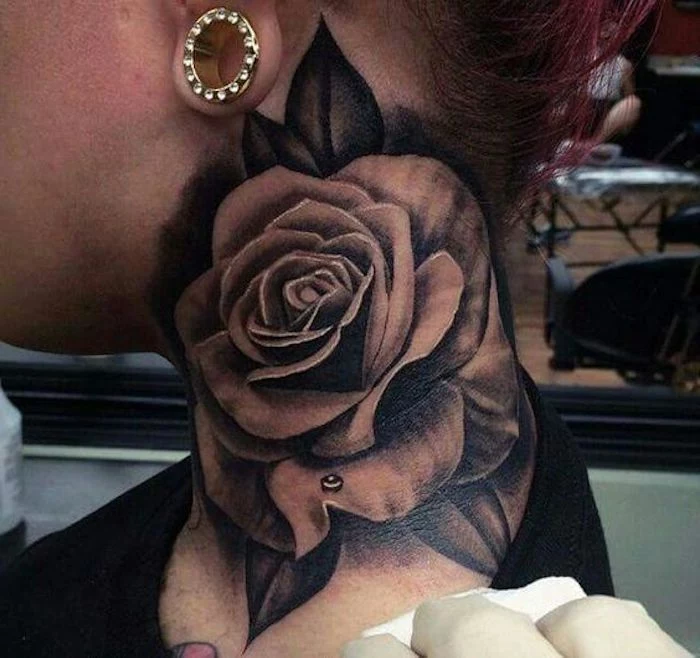 tattoo ideas with meaning, large rose, neck tattoo, red hair, black top