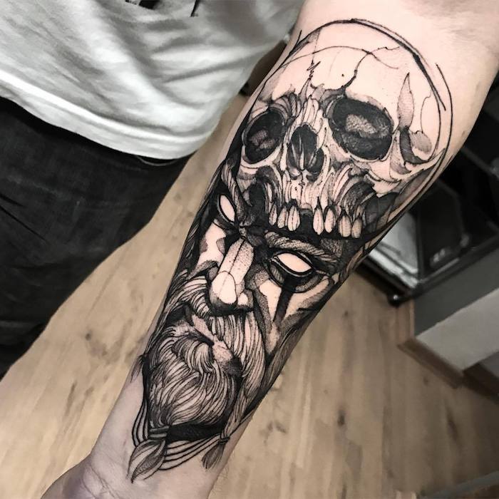tattoos for men, man's face, skull on top of it, forearm tattoo, white shirt, wooden floor
