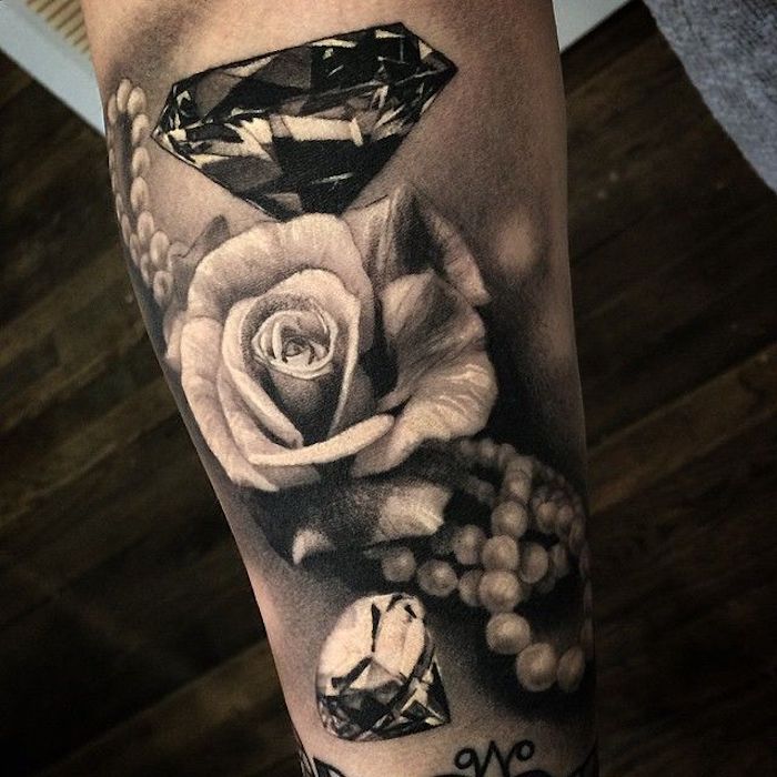 two large diamonds, white pearls and a rose, tattoo ideas with meaning, forearm tattoo