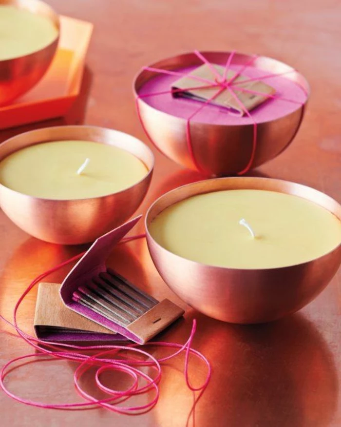 candle wedding favors, brass bowls, candle wax inside, box of matches, pink ribbon