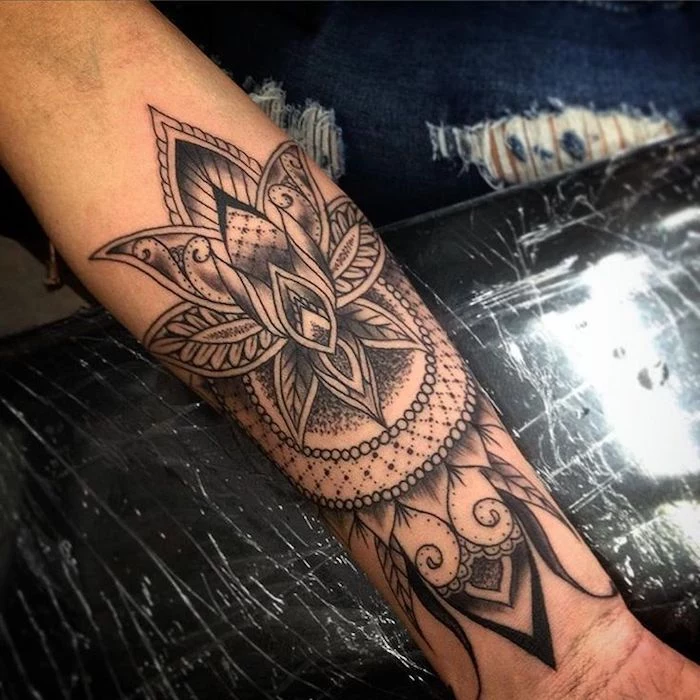 lotus flower, mandala tattoo, forearm tattoo, tattoos for woman, black arm rest