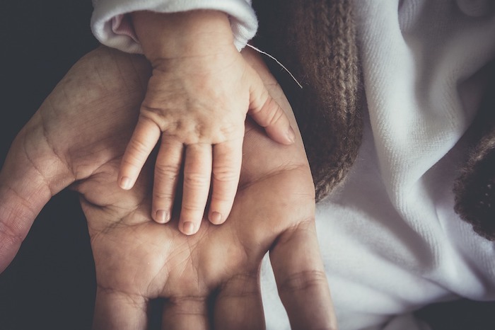 baby's hand, on top of a man's hand, desktop wallpaper tumblr, white blouse